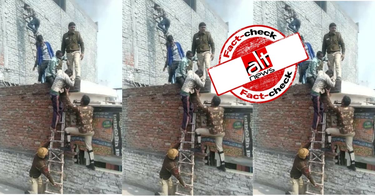 Photo of rescue op viral as cops helping mob carry petrol bombs to AAP's Tahir Hussain's residence - Alt News