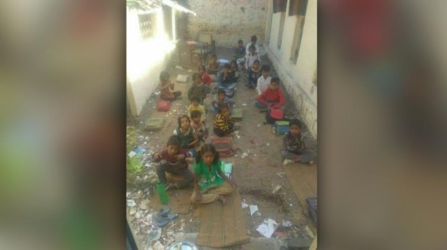 Photo showing school students sitting in open amidst filth is not from Gujarat