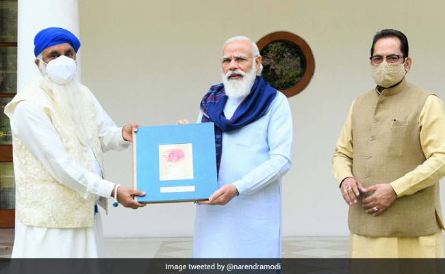 PM Modi Releases Book On Life And Ideals Of Guru Nanak Dev
