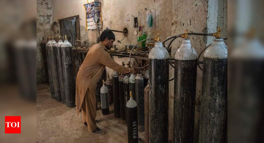 Pakistan suspends staff after oxygen shortage kills Covid patients - Times of India