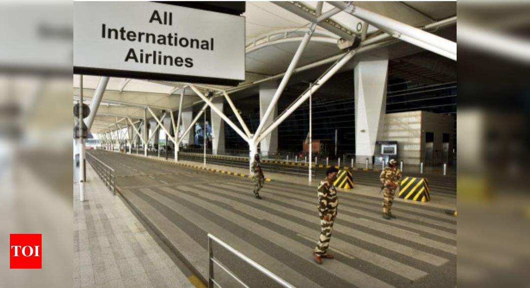 Delhi airport gears up for safe flight operations during fog | Delhi News - Times of India