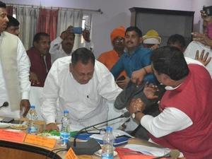 In Uttar Pradesh, BJP MP Sharad Tripathi thrashes party MLA Rakesh Baghel with shoe in public, shocking videos go viral 